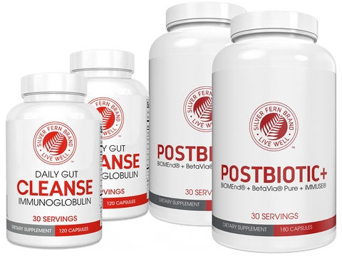 Four white supplement bottles with red and black text on a white background